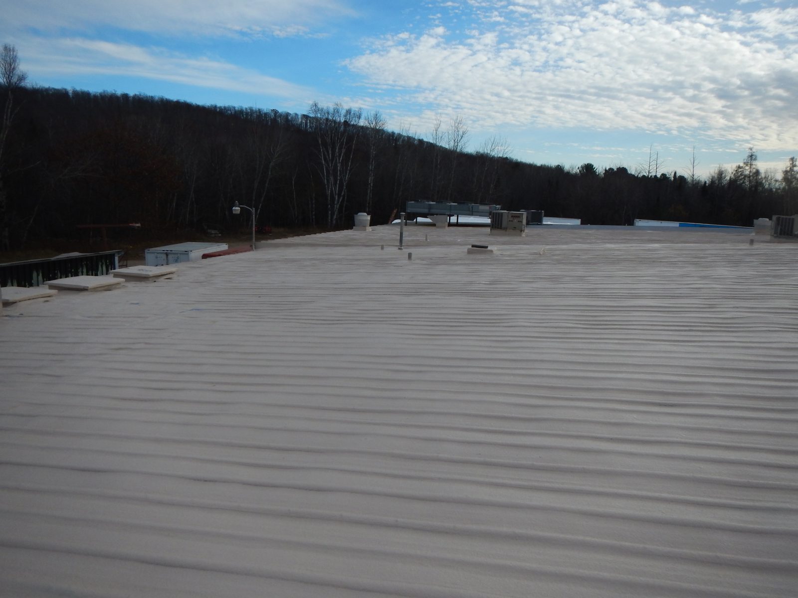 WatchGuard Roof polyurea membrane on a commercial metal roof