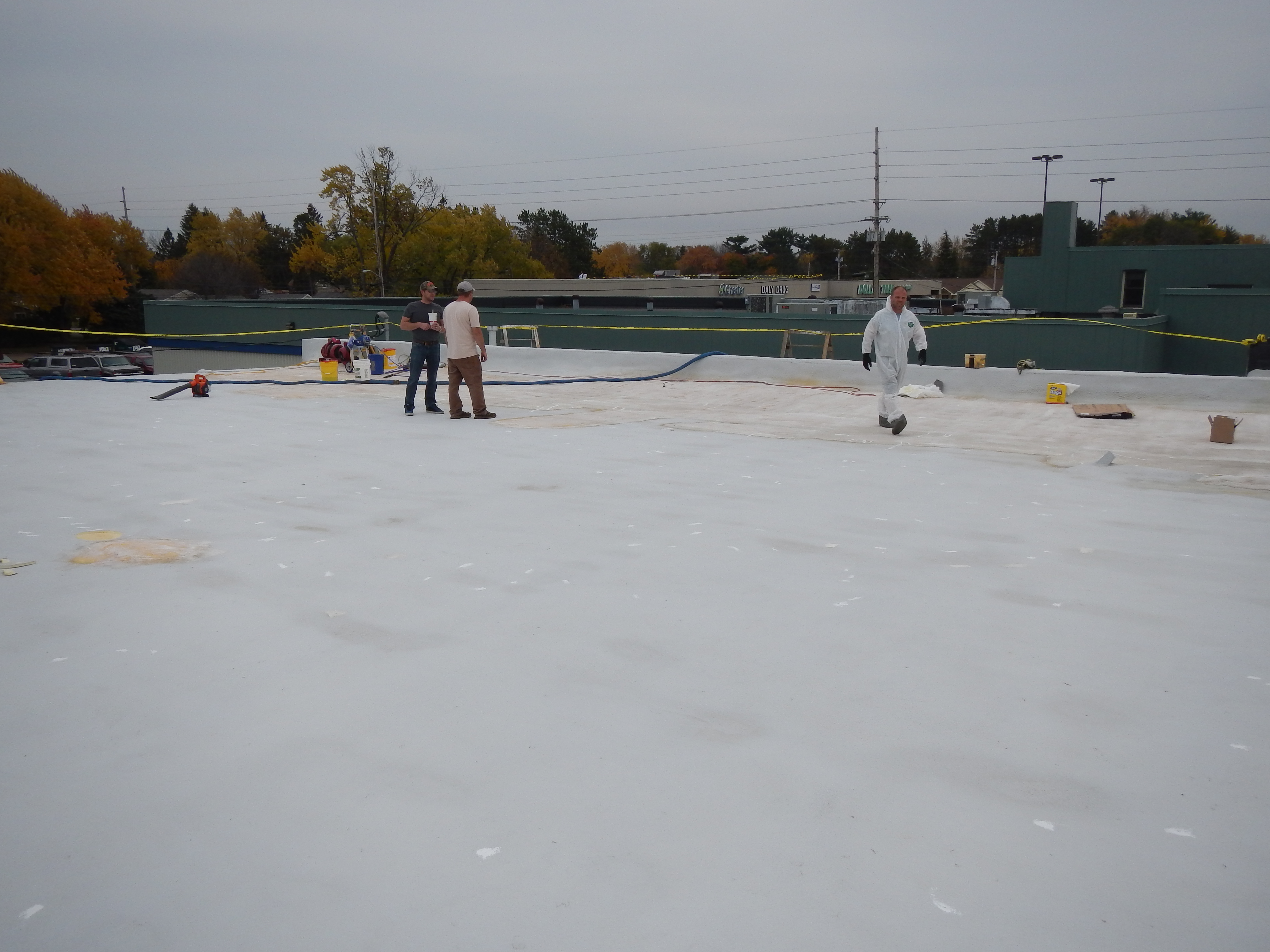 7001 Primer applied to a membrane roof before coating